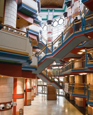 The interior of John Outram’s colourful redesign of Addenbrookes hospital