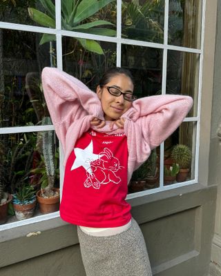 woman wearing oversize shirt with a sweater