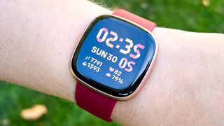 Fitbit Versa 4 on a person's wrist