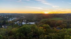 A photograph of an autumn sunset from Barenstein hill above Plauen city in Germany 