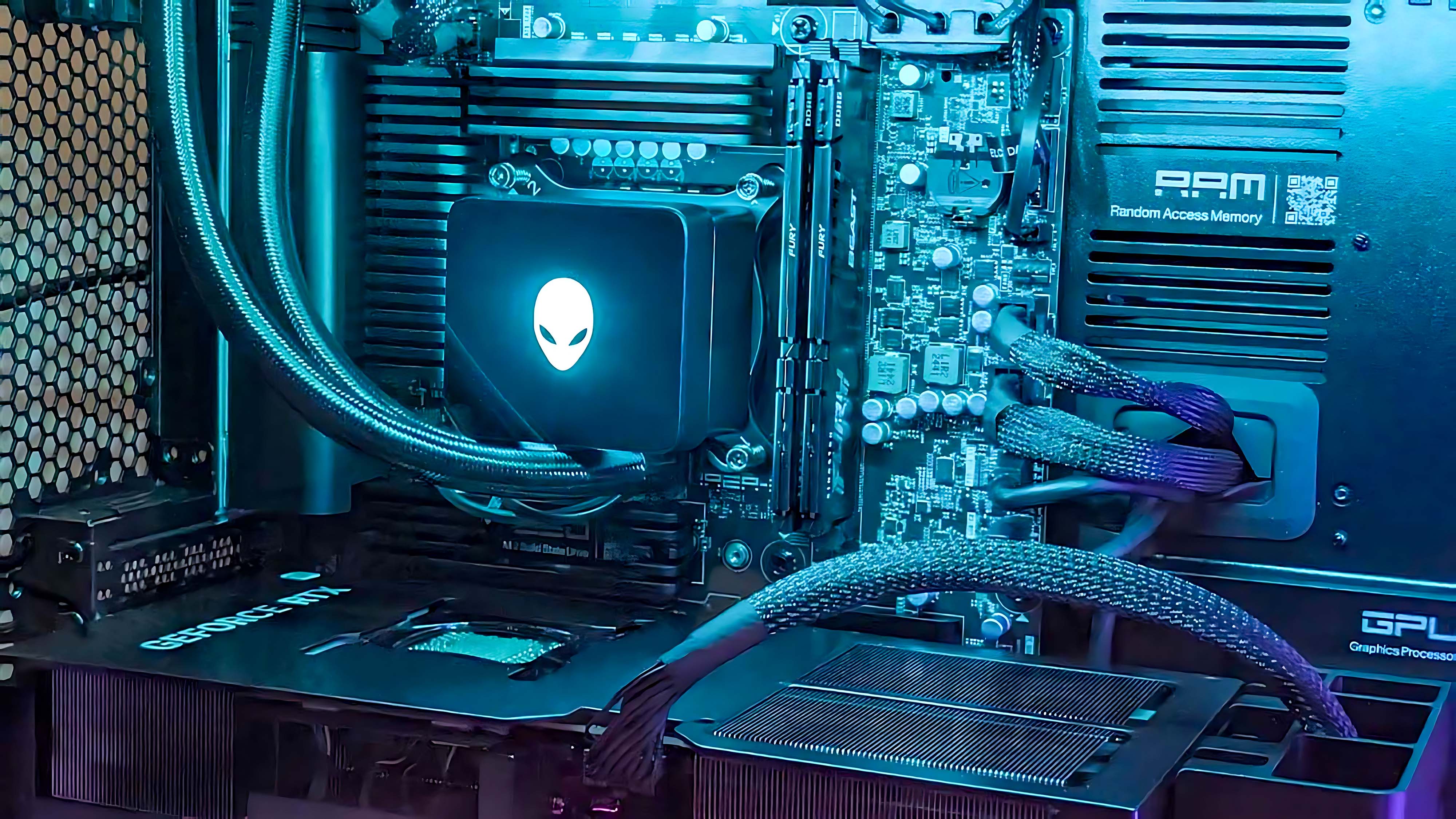 Closeup of the CPU and RAM in the Alienware Area-51 Gaming Desktop (2025) with blue lighting.
