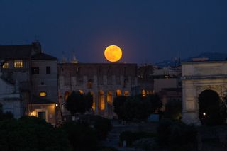 The Flower Moon, as seen from the Capitol over the Colosseum in Italy on May 7, 2020.