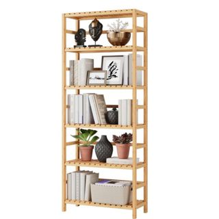 A six tier wooden bookshelf with books and decor on it