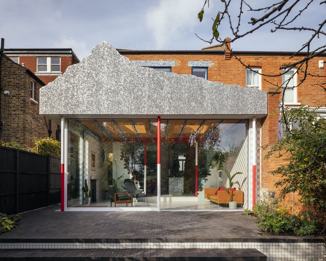 Marble back veranda with glass sliding doors.