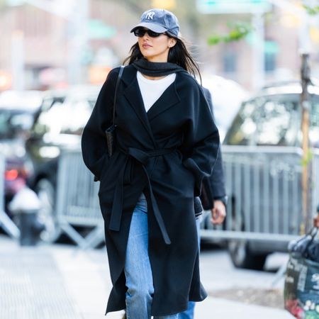 Kendall Jenner in a black coat. 