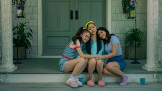 the Covey sisters hugging in All The Boys I've Loved Before
