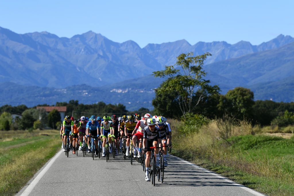 BORGOSESIA ITALY OCTOBER 07 Emil Nygaard Vinjebo of Denmark and Nielsen Andreas Stokbro of Denmark and Team Qhubeka Nexthash lead The Peloton during the 105th Gran Piemonte 2021 a 168km race from Rocca Canavese to Borgosesia 350m GranPiemonte on October 07 2021 in Borgosesia Italy Photo by Tim de WaeleGetty Images