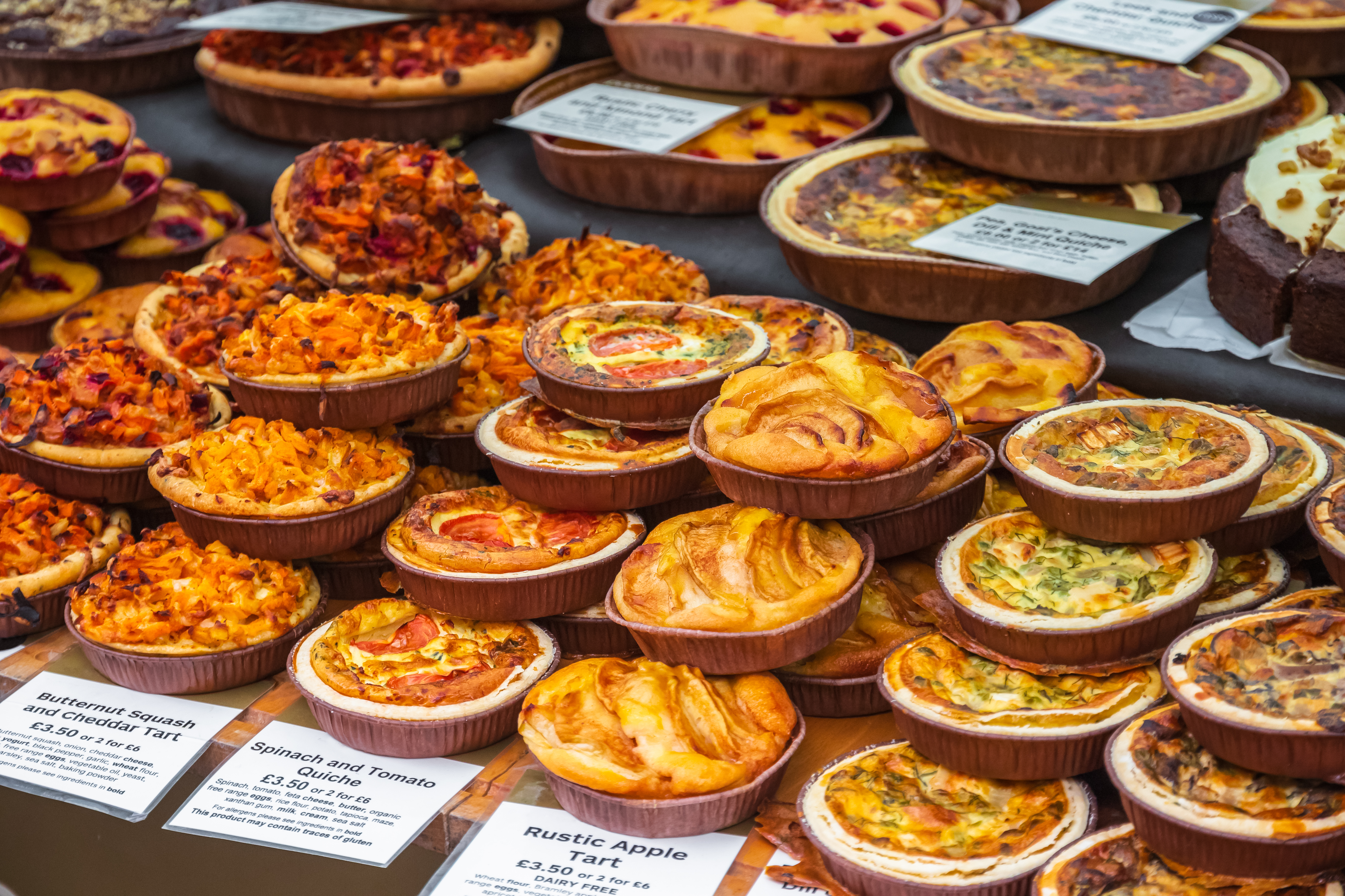 Dozens of tarts on display at Broadway Market in Hackney