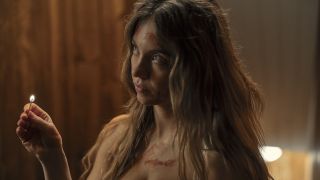 Sydney Sweeney with a lit match in The Housemaid