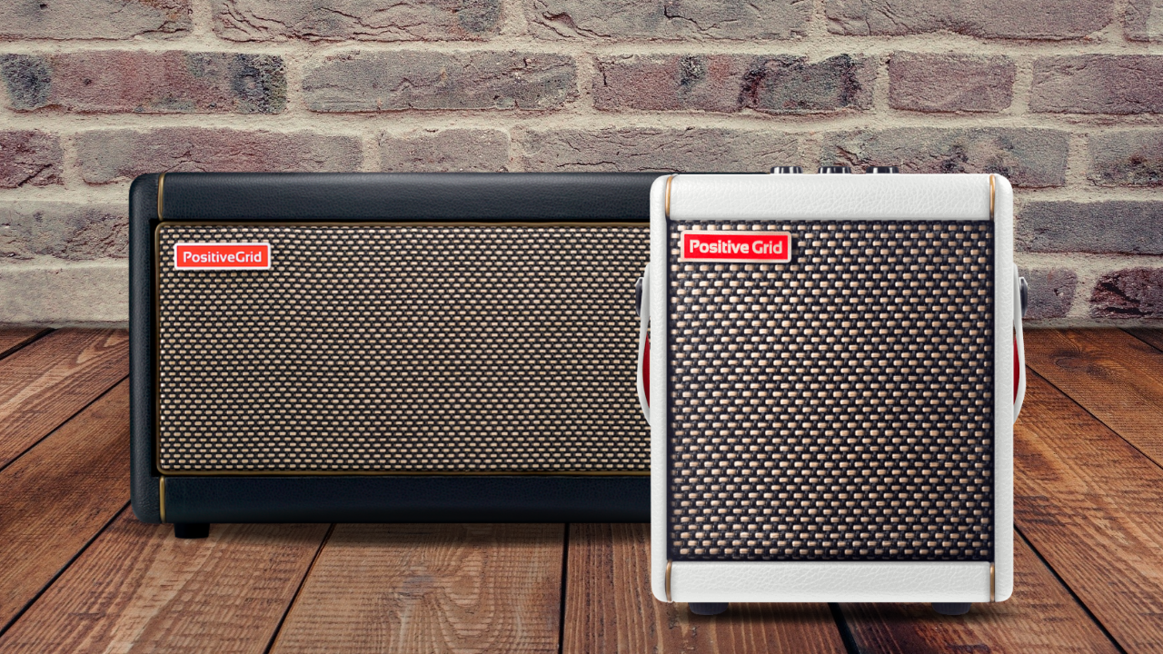 Positive Grid Spark Mini and Positive Grid Spark Pearl side by side on a stage with brick wall