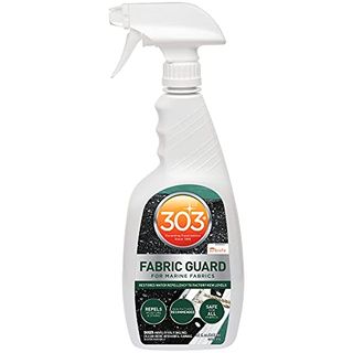 A white spray bottle of 303 Products Marine Fabric Guard with black and green label and orange logo