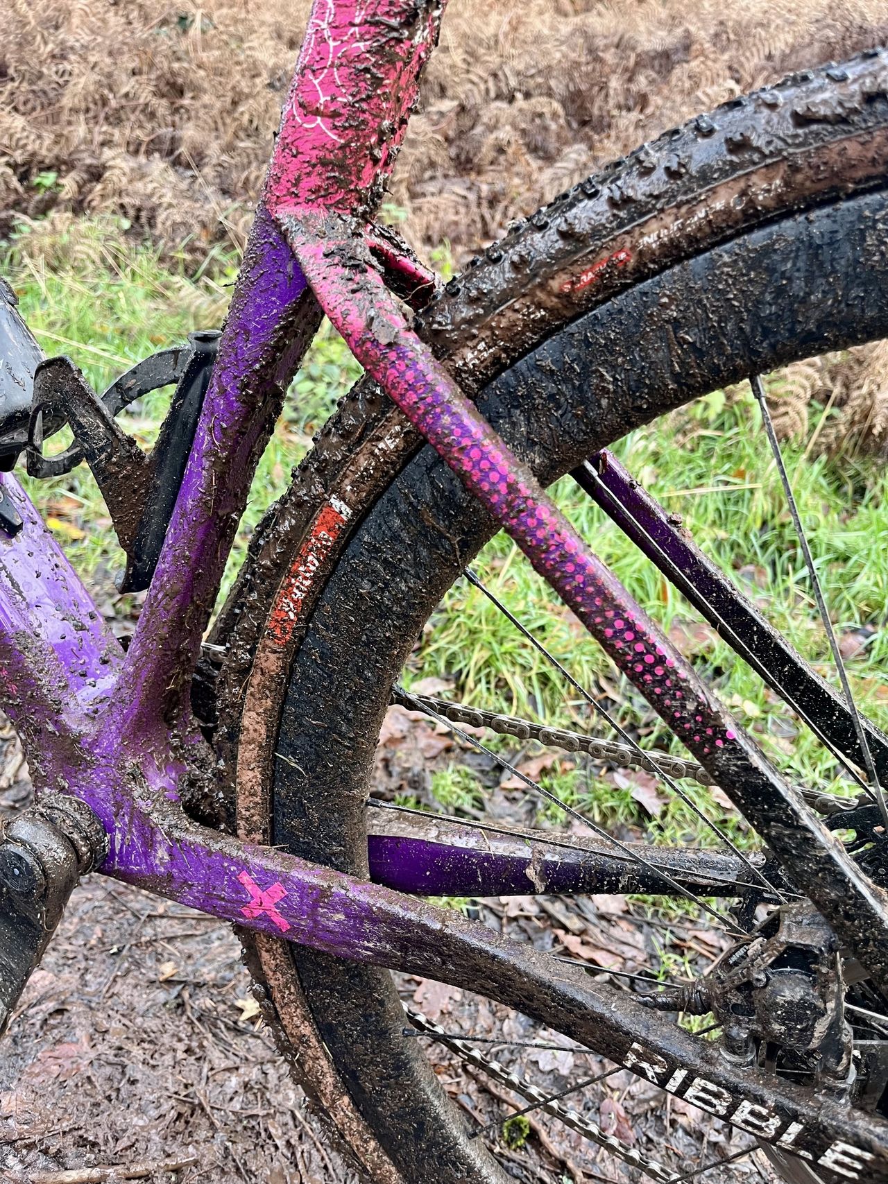 A gravel bike covered in mud