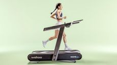 woman running on Wahoo KICKR RUN Treadmill