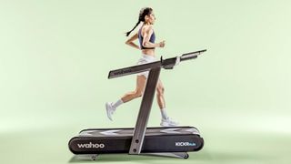 woman running on Wahoo KICKR RUN Treadmill