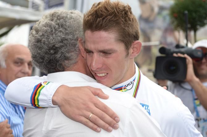Rui Costa (Portugal) is congratulated after winning the 2013 road race world championship