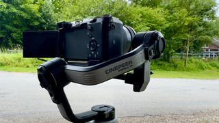 Zhiyun Cinepeer Weebill 3E gimbal being held up by a person