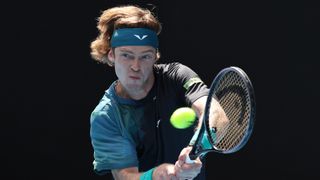  Andrey Rublev plays a backhand in the Australian Open 2024 ahead of the Eubanks vs Rublev live stream