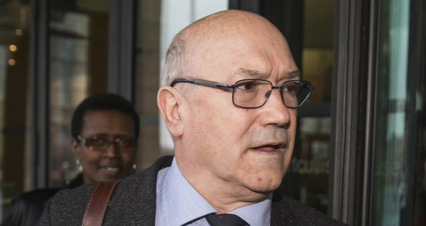 Oxfam CEO Mark Goldring arrives to face a select committee hearing in London
