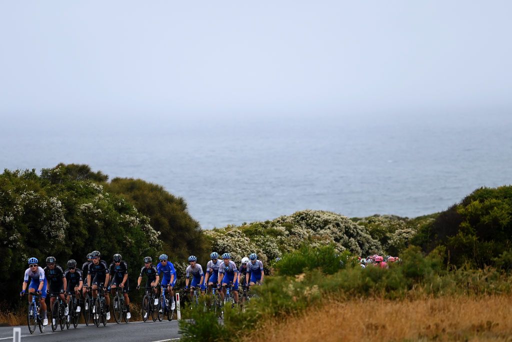 GEELONG AUSTRALIA JANUARY 29 A general view of the peloton passing through Bells Beach during the 7th Cadel Evans Great Ocean Road Race 2023 Mens Elite a 1743km one day race from Geelong to Geelong CadelRoadRace on January 29 2023 in Geelong Australia Photo by Tim de WaeleGetty Images