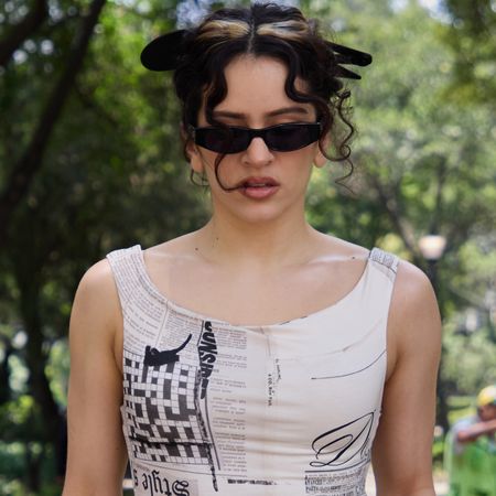 Rosal&iacute;a styled a newspaper dress from Desigual with heeled ballet flats 