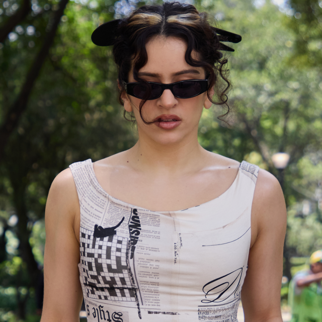 Rosal&iacute;a styled a newspaper dress from Desigual with heeled ballet flats 