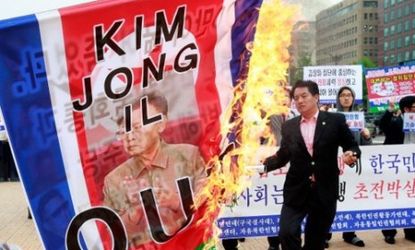 South Koreans protest the North Korean missile attack.