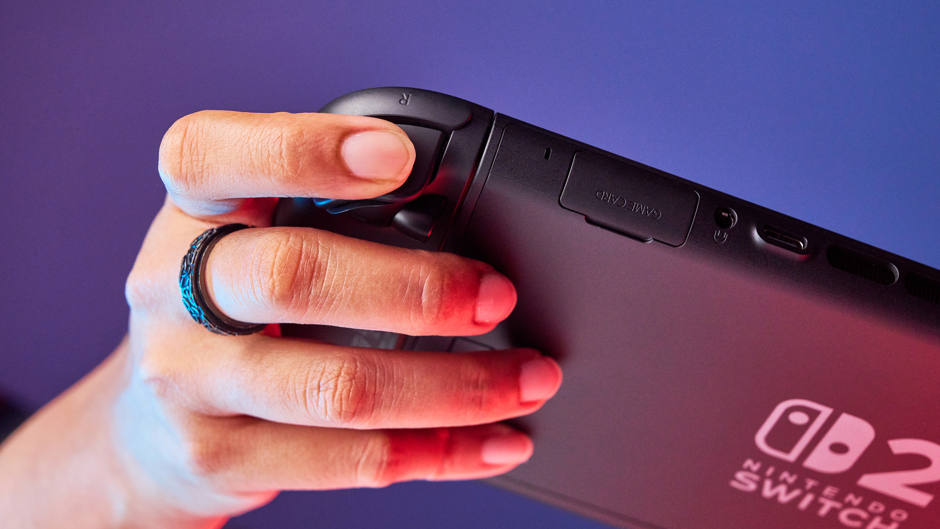 A Nintendo Switch 2 photographed under RGB lighting