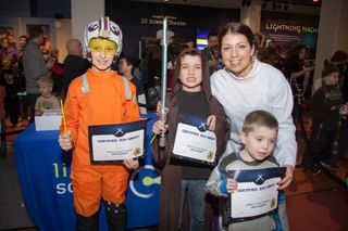 Newly certified Jedi knights pose at Liberty Science Center Feb. 12.