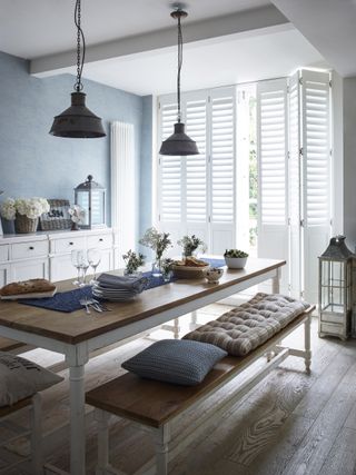 floor length shutters in a dining room