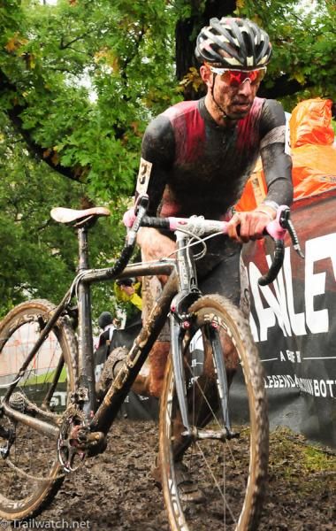 Jeremy Powers (Rapha Focus) running the steep hill that he rode on Saturday