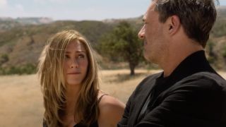 Jennifer Aniston talking to Jon Hamm in The Morning Show Season 3 Trailer