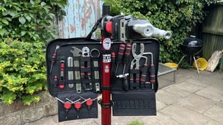 Feedback Sports Team Edition Tool Kit hanging on workstand