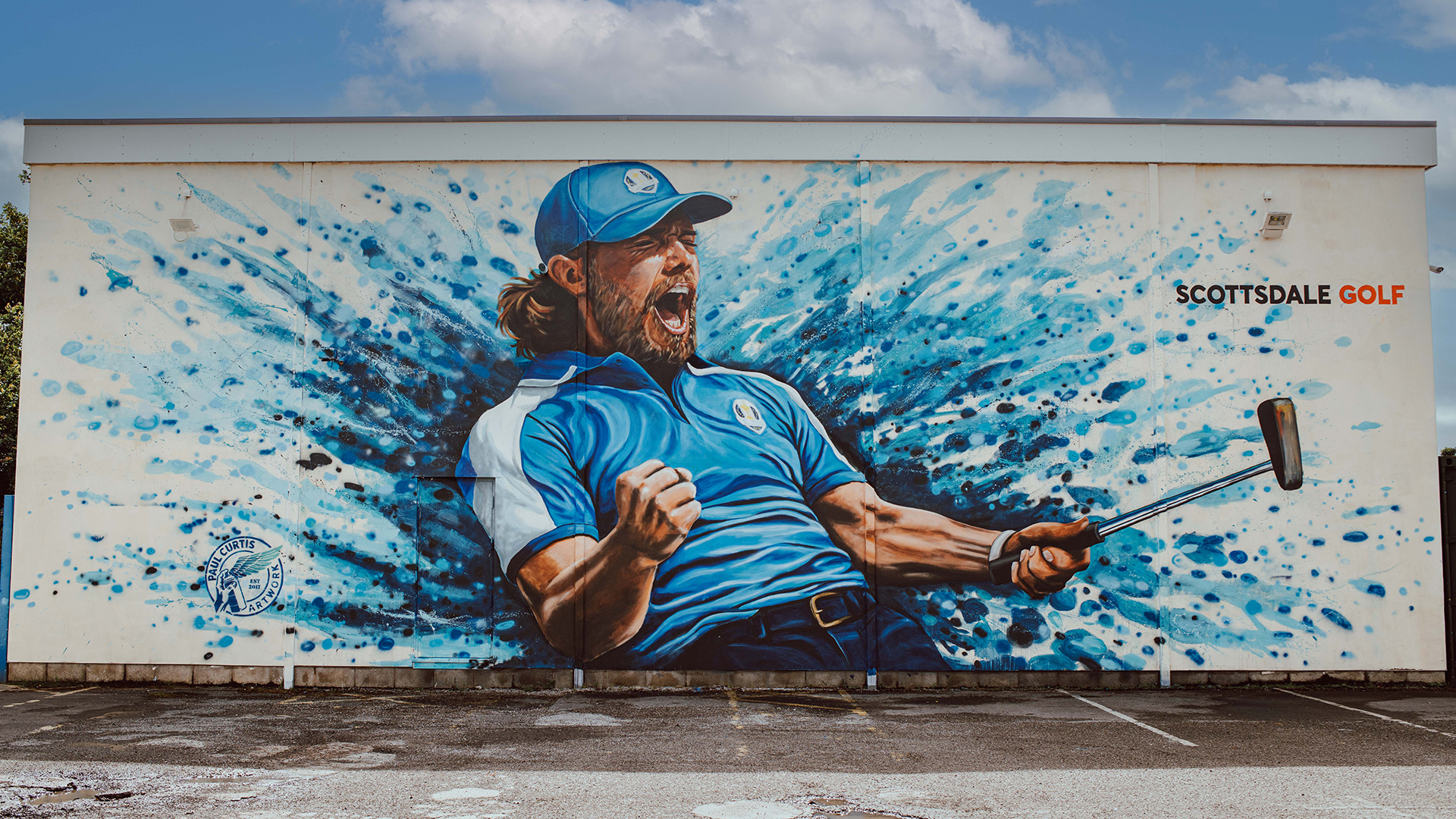 A mural of Tommy Fleetwood features on the side of a Southport social club