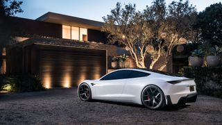 Tesla Roadster 2022 parked on a driveway