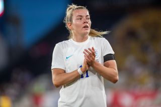 Lauren Hemp playing football for the lionesses