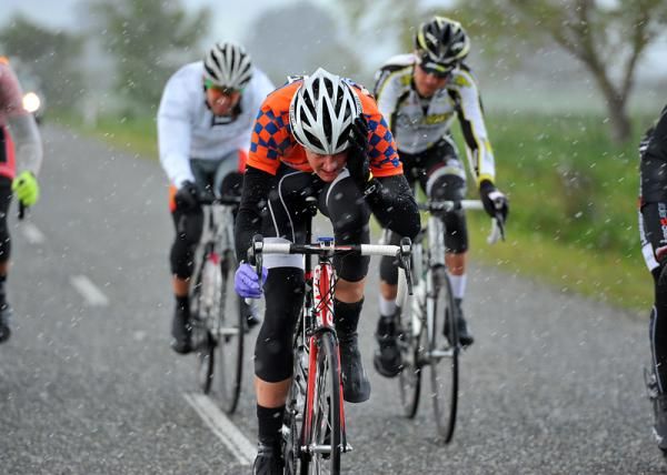 A rider protects himself from the driving snow