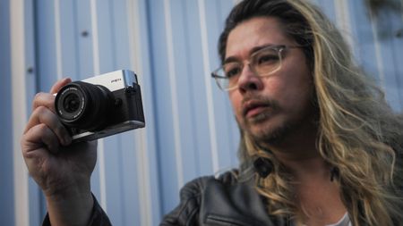 James Artaius shooting with the OM System PEN and the OM System M.Zuiko 14-42mm f/3.5-5.6 III in an urban setting