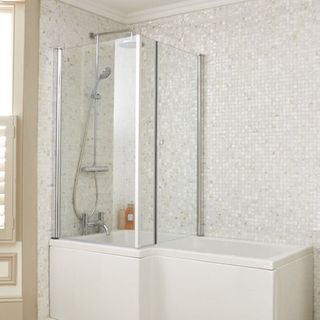 Bathstore ShowerCube L shaped bath screen in white bathroom