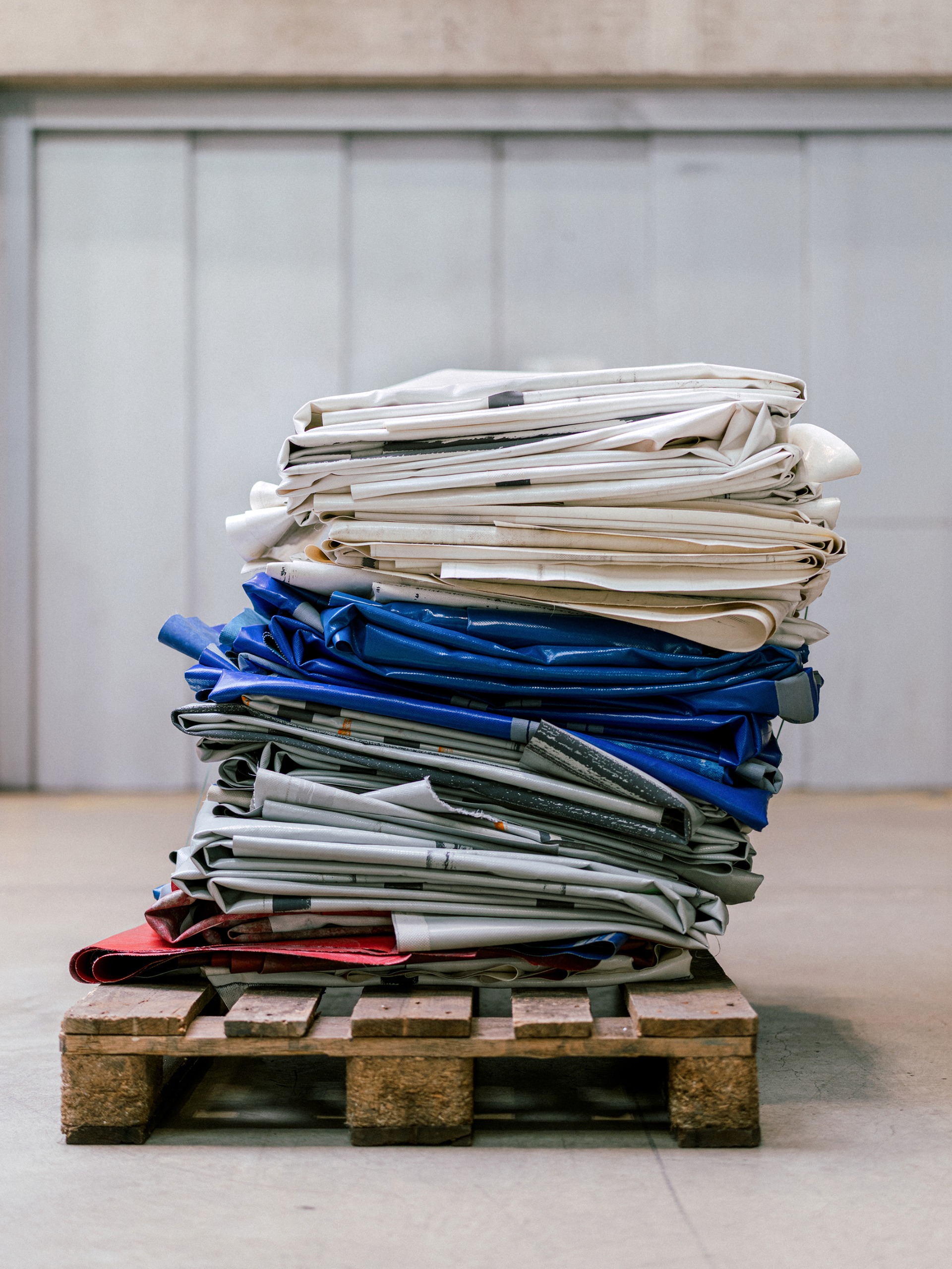 The raw tarpaulins before transformation into bags