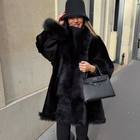 woman wearing leggings with boots outfit 2026