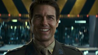 Tom Cruise smiling at the end of Edge of Tomorrow