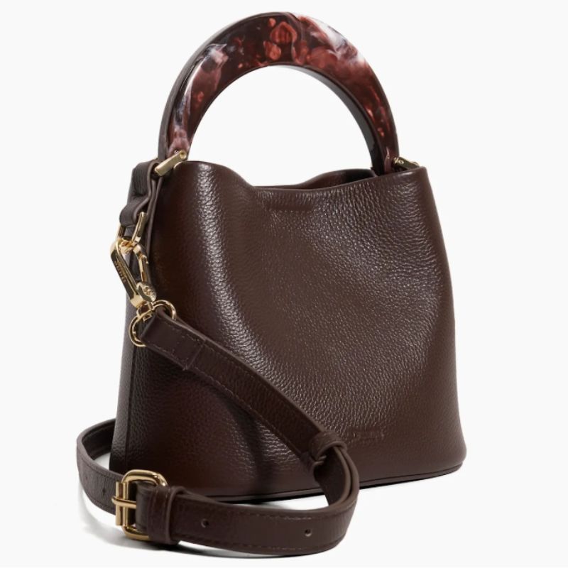 Jennifer Aniston&#039;s Dharla Moulded Handle Bag from Dune London