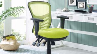 Modway Articulate Mesh Office Chair review: An image of the chair in yellow sat next to a white desk