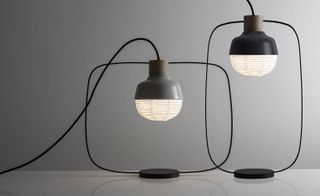 ’The New Old’ light is a statement piece that changes a space with its black wire silhouette