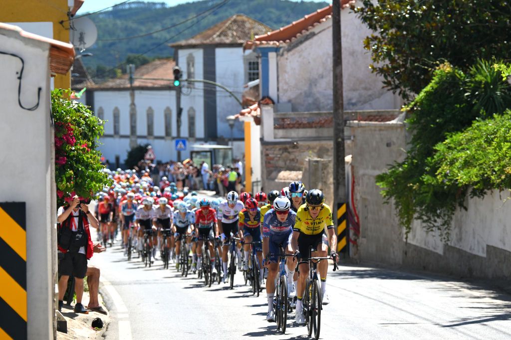 OUREM PORTUGAL AUGUST 18 Robert Gesink of The Netherlands and Team Visma Lease a Bike leads the peloton during the 79th La Vuelta Ciclista a Espana 2024 Stage 2 a 194km stage from Cascais to Ourem UCIWT on August 18 2024 in Ourem Portugal Photo by Tim de WaeleGetty Images