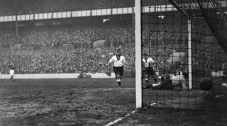 George Camsell scoring the first goal against Germany during England's 3-0 victory in an international friendly match at White Hart Lane, 4th December 1935. (Photo by Keystone/Hulton Archive/Getty Images)
