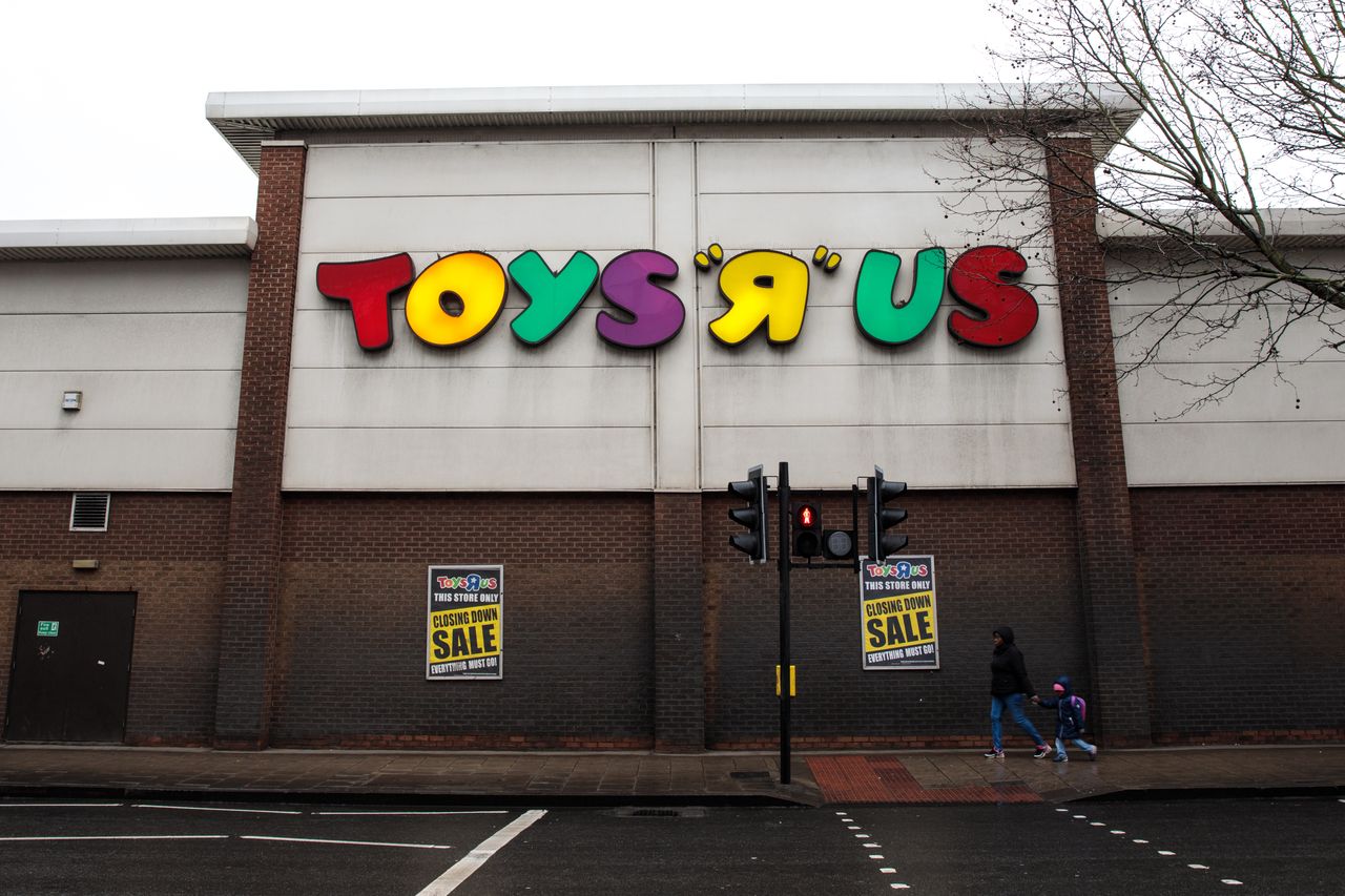 A Toys R US covered in &amp;#039;closing&amp;#039; signs