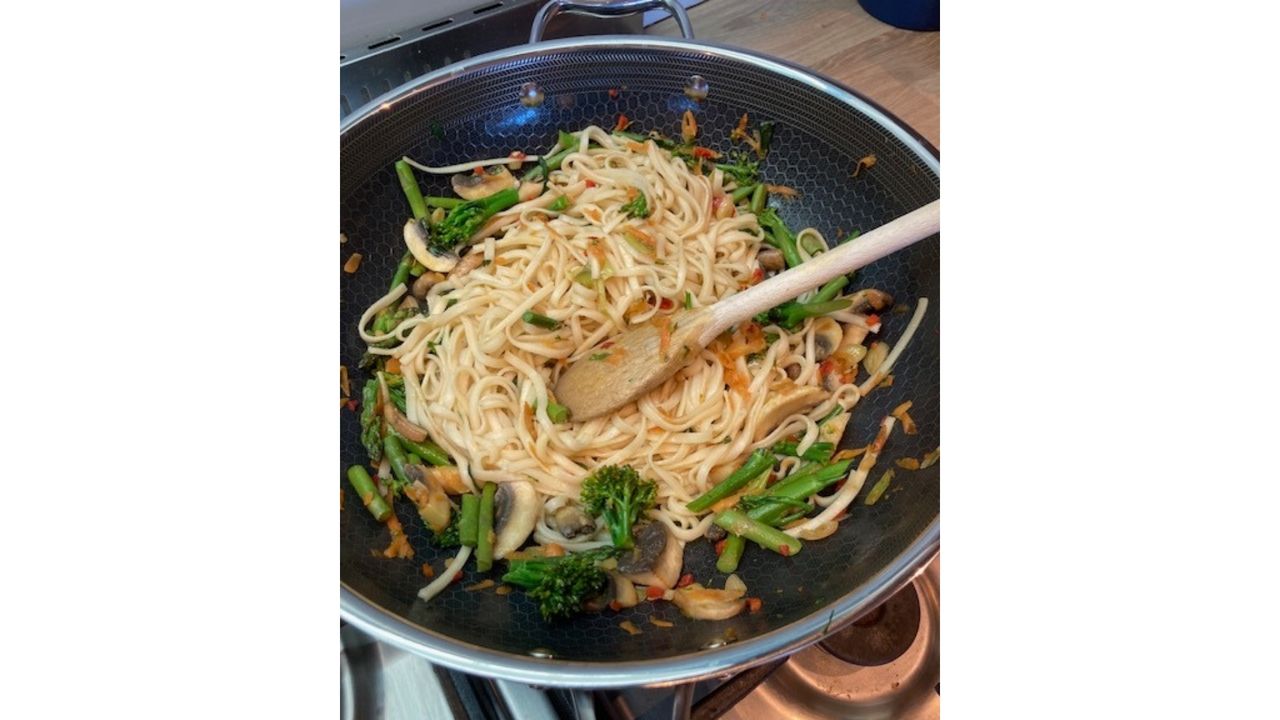 A stir fry cooked in a pan that forms part of the 13-piece Hybrid Cookware Set