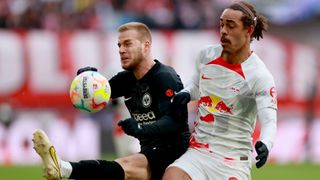 Hrvoje Smolcic of Eintracht Frankfurt and Yussuf Poulsen of RB Leipzig battle for the ball