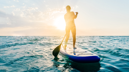 Person stand-up paddle boarding